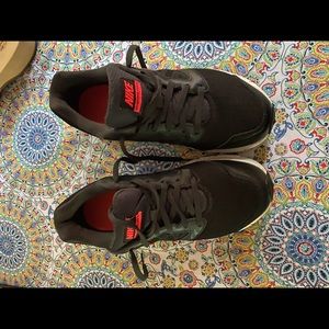 Black and pink Nike running sneakers